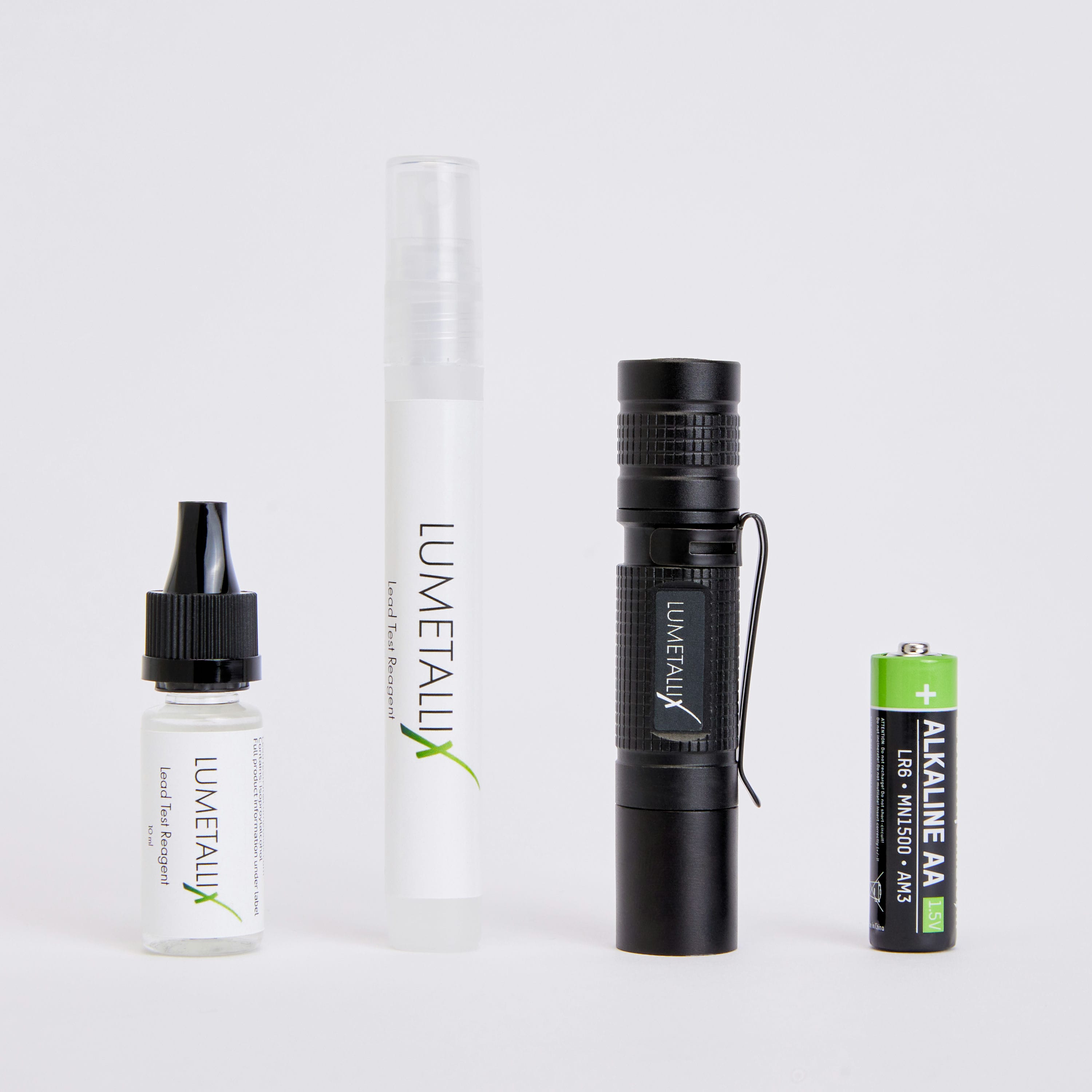 A collection of items including a bottle with a green label, a spray bottle, a black handheld device, and a battery, all labeled with 'Lumetallix' branding.